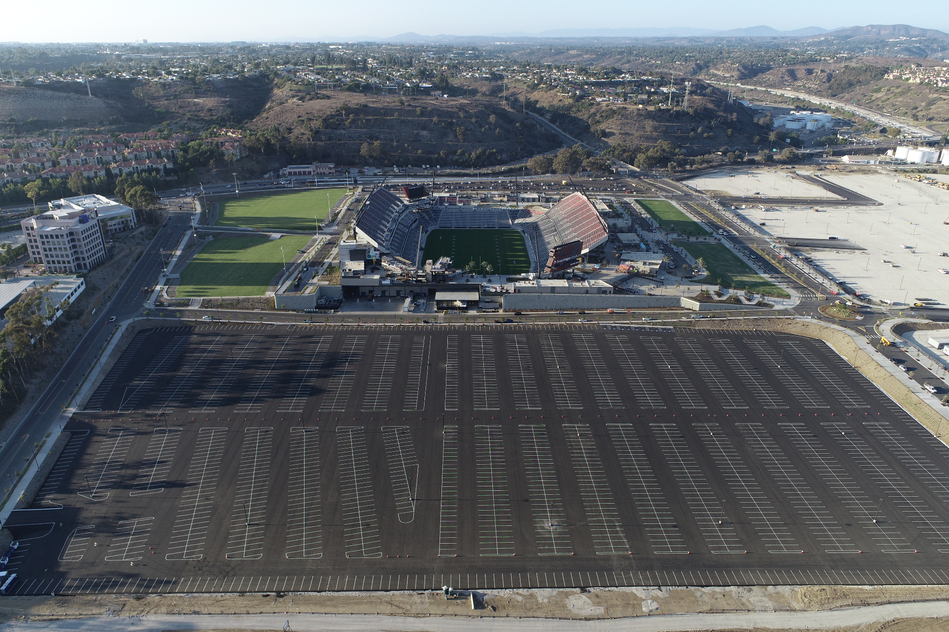 Aerial view of SDSU Snapdragon Stadium parking lot and stadium completed by Western Paving